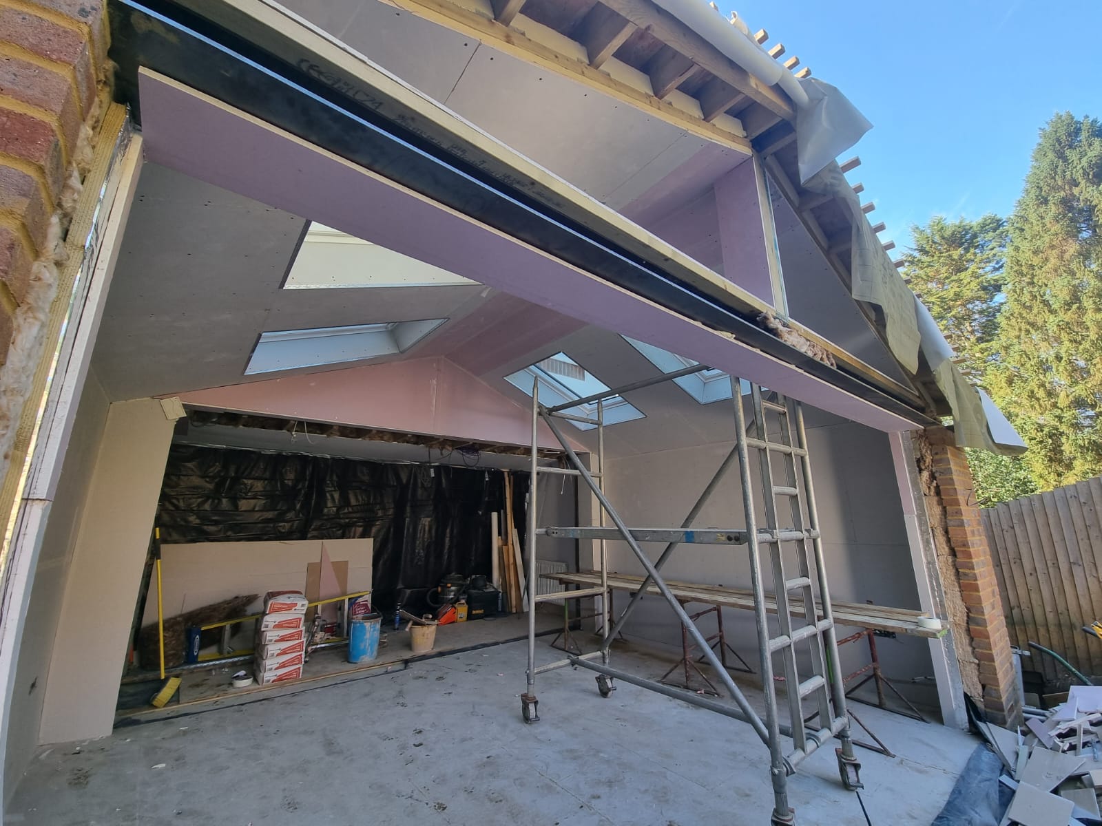 Garage conversion in progress being turned into a warm insulated room