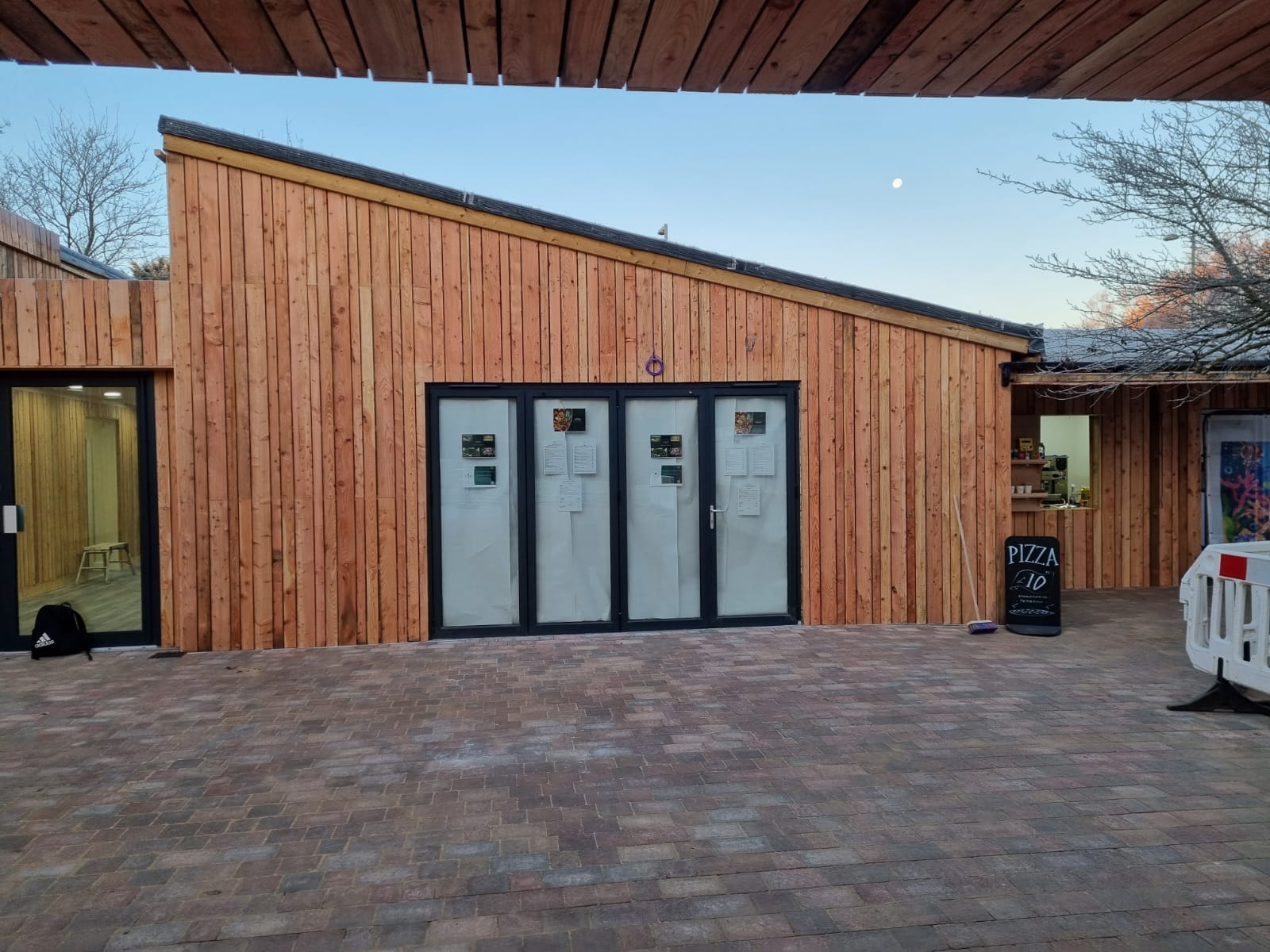 Timber-clad commercial building exterior completed by DAB
